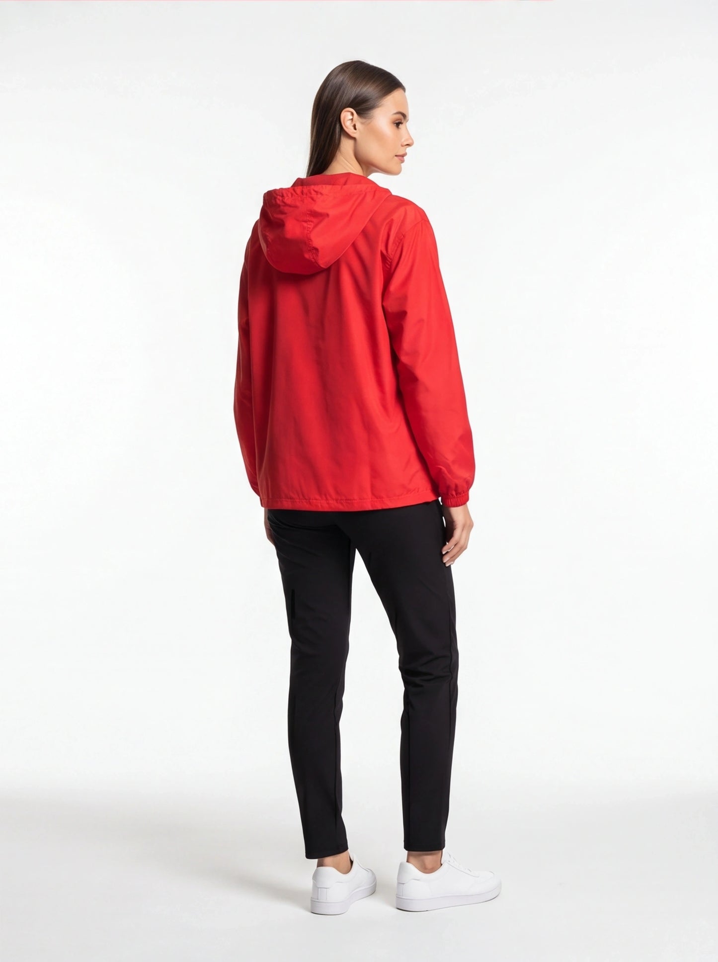 Person wearing a red raincoat on a white background